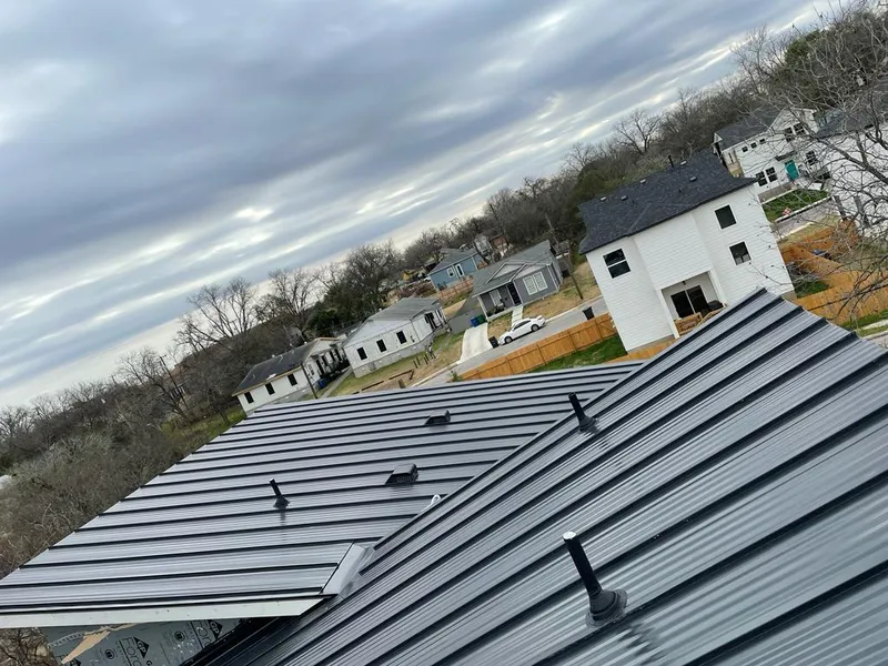 Standing seam metal roof panels with vents for Skylight Repair in Hiram